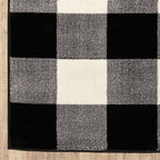 HomeRoots Black Polypropylene 10’ x 13’ Monochromatic Gingham Pattern Indoor Area Rug
