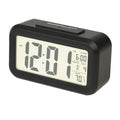 RCA Portable Alarm Clock with Auto Night Light Sensor, Adjustable Brightness, Indoor Temperature Display, Full Calendar with 12 
