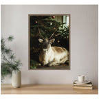 Sylvie Framed Canvas Reindeer Sitting Under a Christmas Tree by Michael Schauer