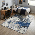 5 X 7 Blue Black Beige And Ivory Abstract Area Rug