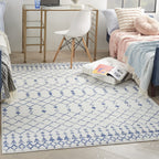 HomeRoots 100% Polypropylene 6’ x 9’ Ivory and Blue Berber Pattern Area Rug