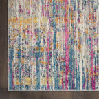 HomeRoots Ivory/Multi 100% Polypropylene 5’ x 7’ Ivory Abstract Striations Area Rug