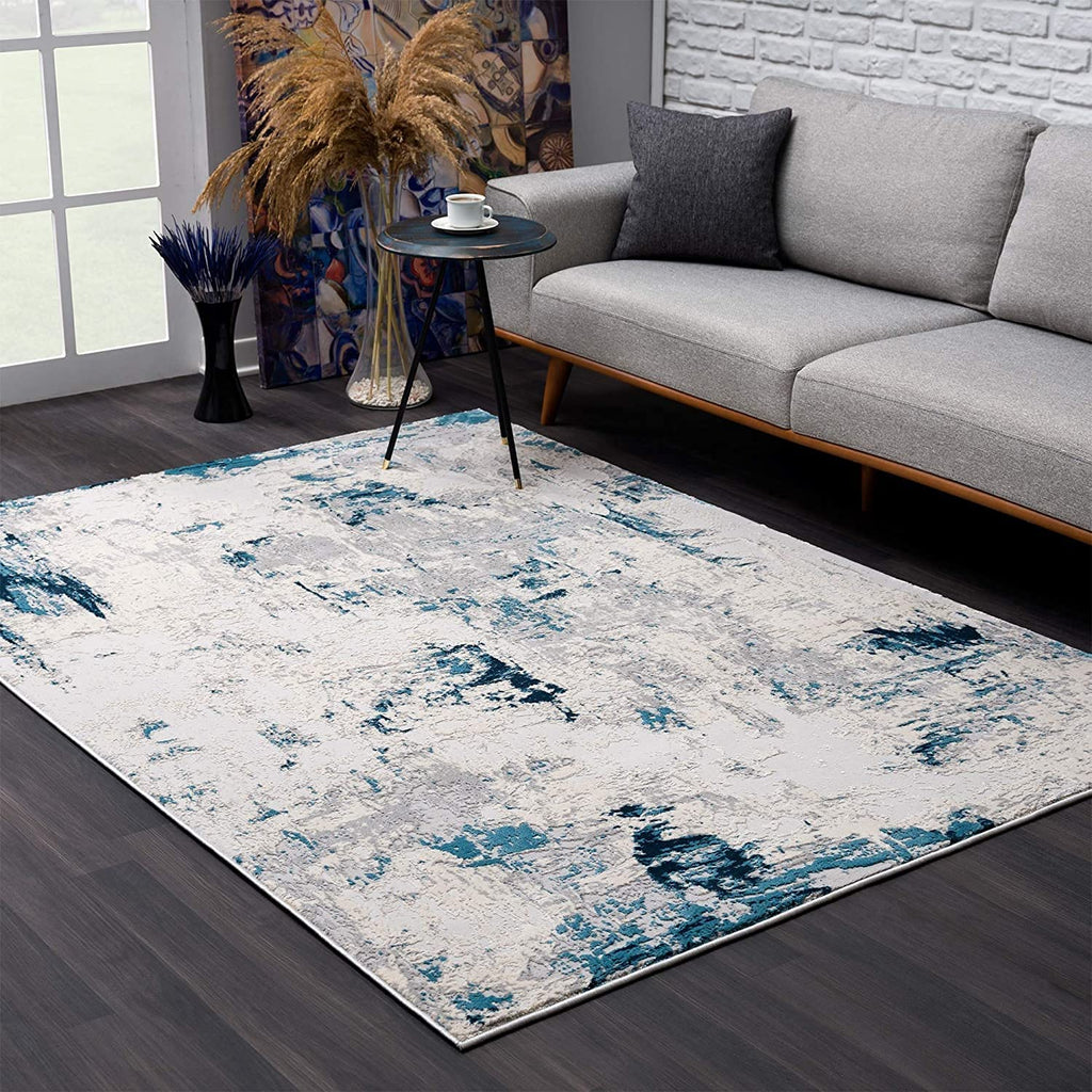 HomeRoots 100% High Grade Polypropylene 3â€ x 5â€ Blue and Ivory Abstract Strokes Area Rug