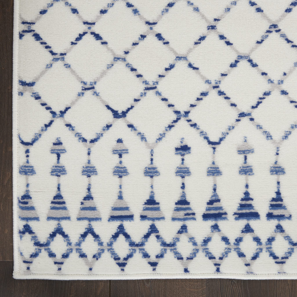 HomeRoots 100% Polypropylene 6’ x 9’ Ivory and Blue Berber Pattern Area Rug