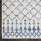 HomeRoots 100% Polypropylene 6’ x 9’ Ivory and Blue Berber Pattern Area Rug