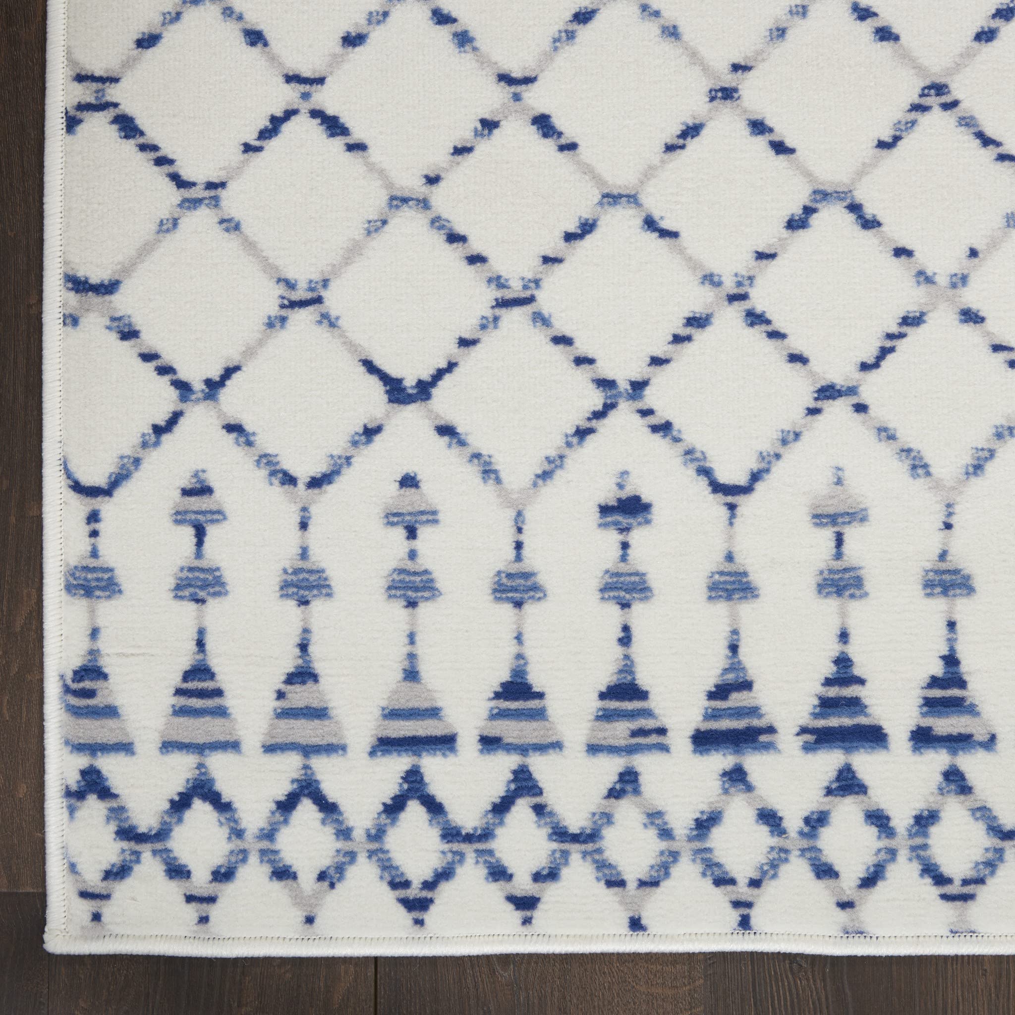 HomeRoots 100% Polypropylene 6’ x 9’ Ivory and Blue Berber Pattern Area Rug
