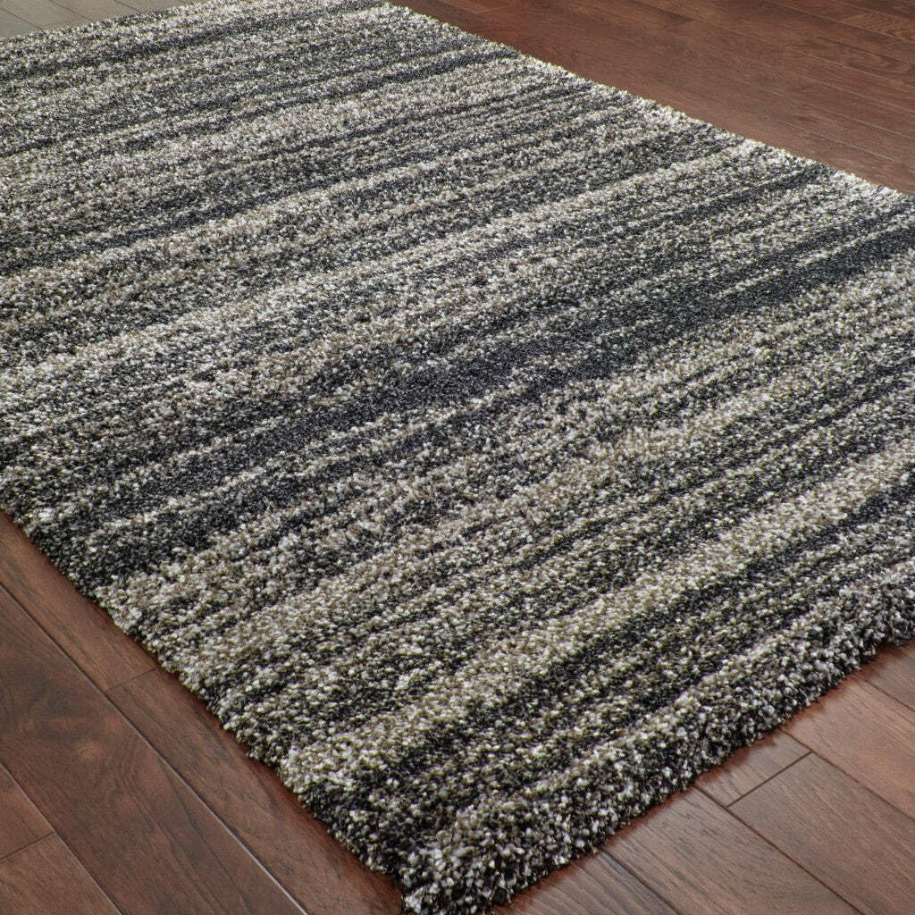 HomeRoots 507911 8 x 11 ft. Charcoal Silver & Gray Geometric Shag Power Loom Stain Resistant Rectangle Area Rug