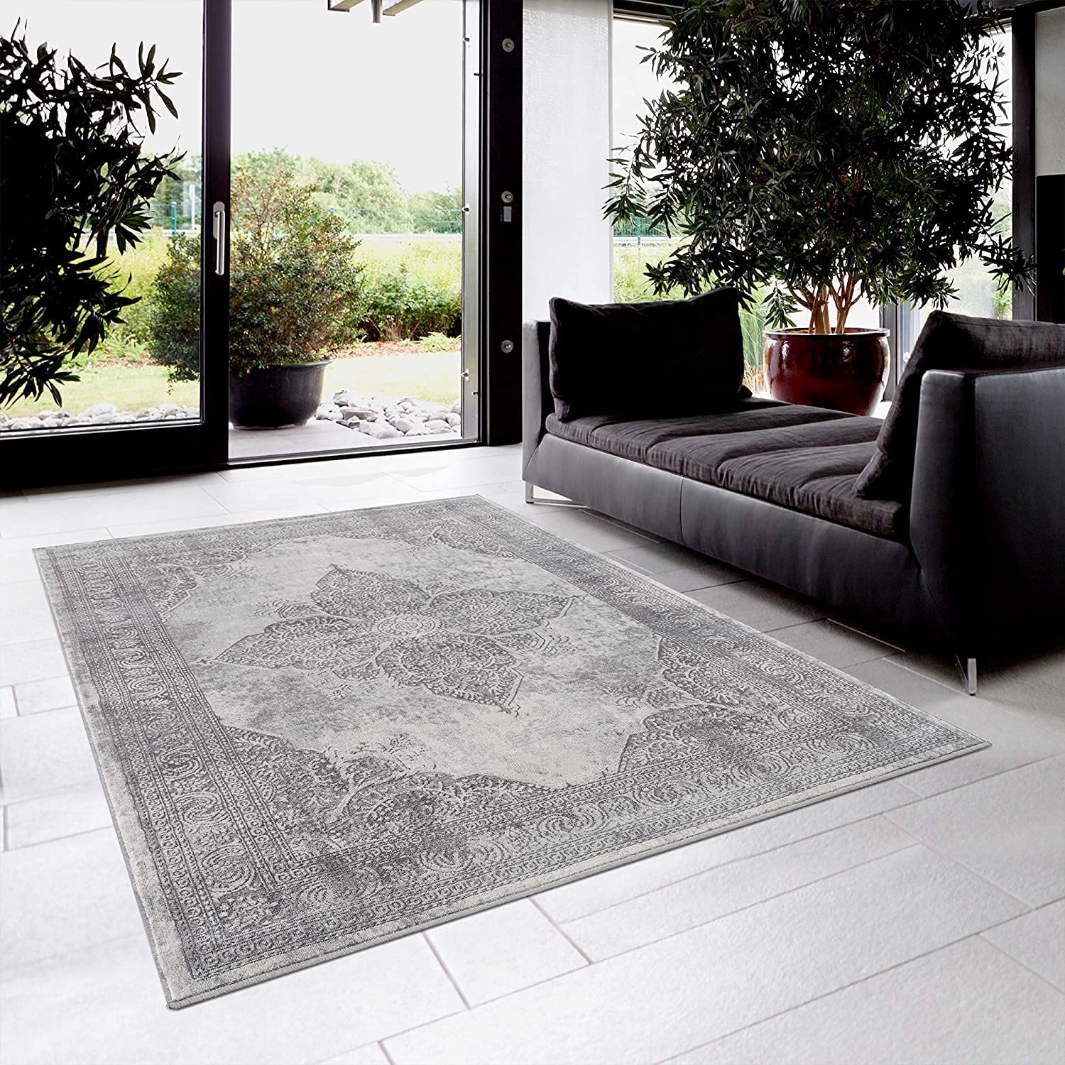 HomeRoots Grey 100% Polypropylene 2’ x 4’ Gray Distressed Medallion Area Rug