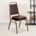 Flash Furniture HERCULES Series Trapezoidal Back Stacking Banquet Chair in Brown Vinyl - Gold Frame