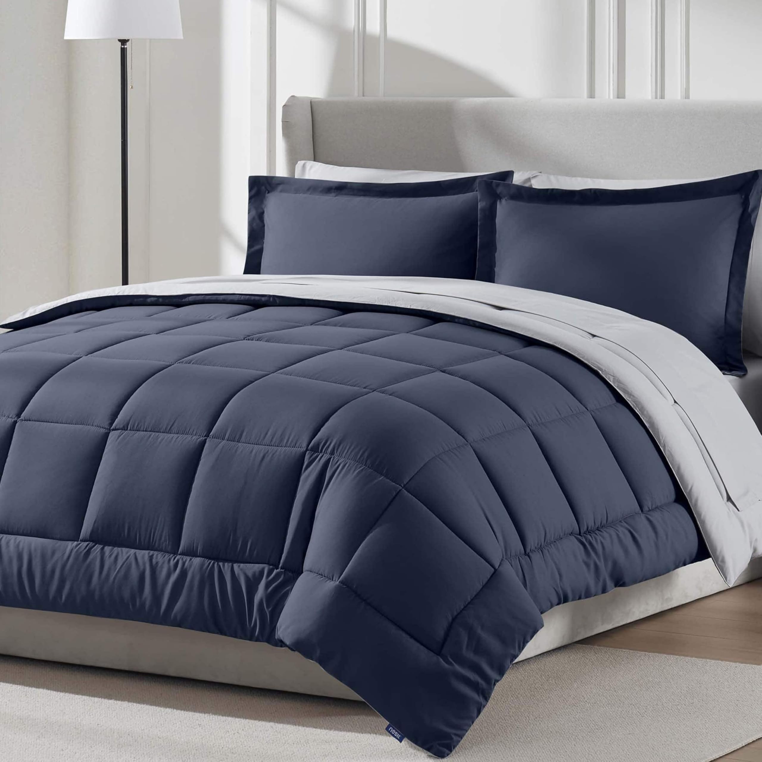 Nestl 7 Piece California King Comforter Set - Navy Reversible Bed in a Bag - Complete Cal King Size Bedding Set with Sheets, Pil