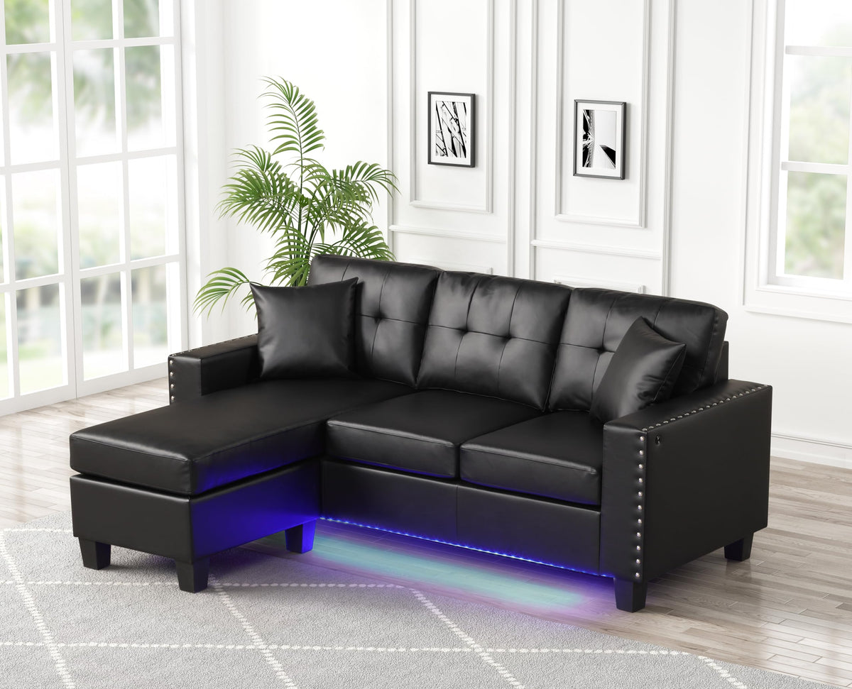 Sorenza 74" W Black PVC Reversible Sectional Sofa Chaise with LED Light, USB Port, Nailhead Trim, Throw Pillows, Tufted Cushion