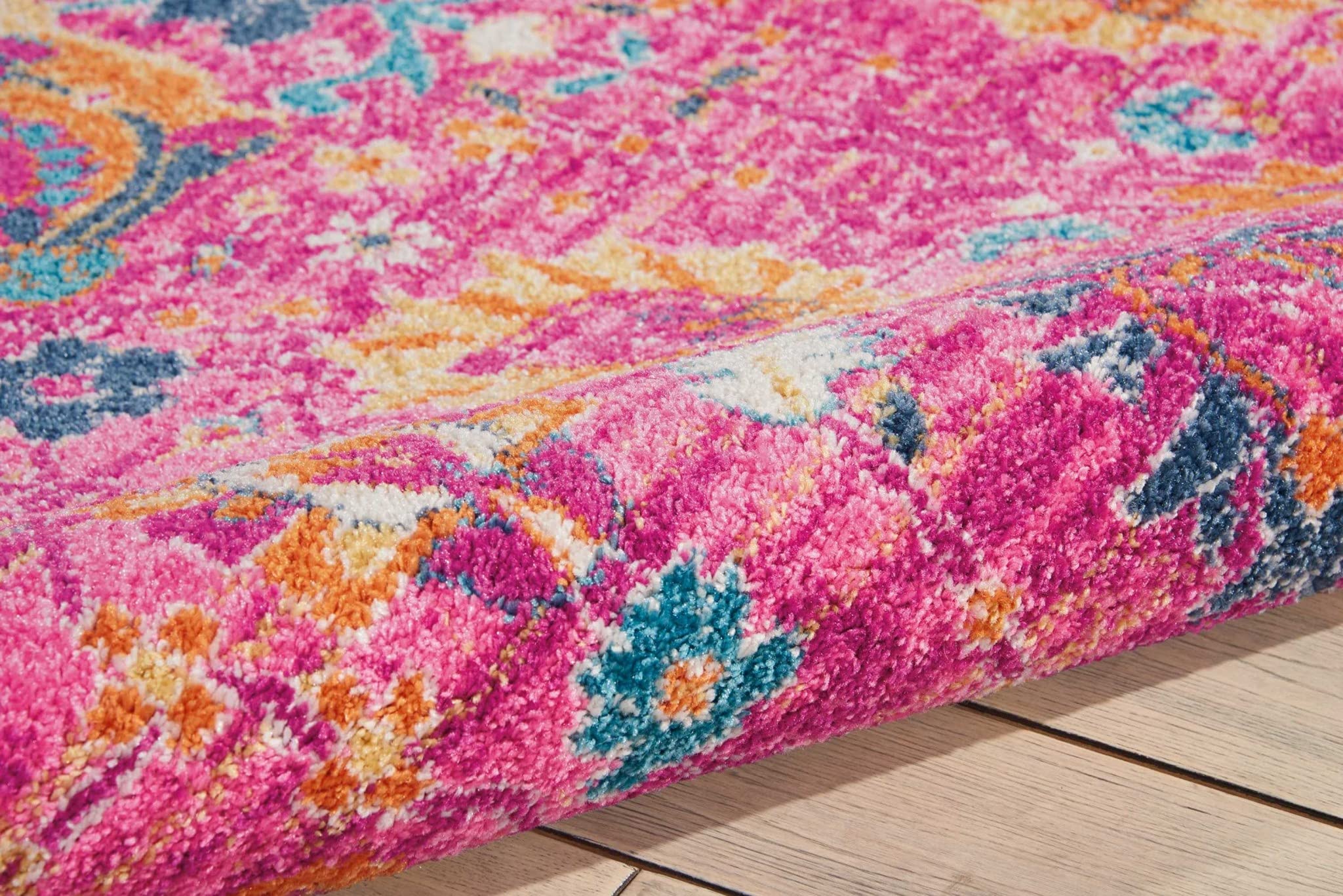 HomeRoots 100% Polypropylene 7’ x 10’ Fuchsia and Orange Distressed Area Rug