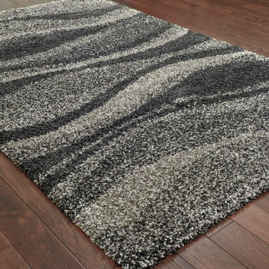 HomeRoots 507868 8 x 11 ft. Charcoal Silver & Gray Abstract Shag Power Loom Stain Resistant Rectangle Area Rug