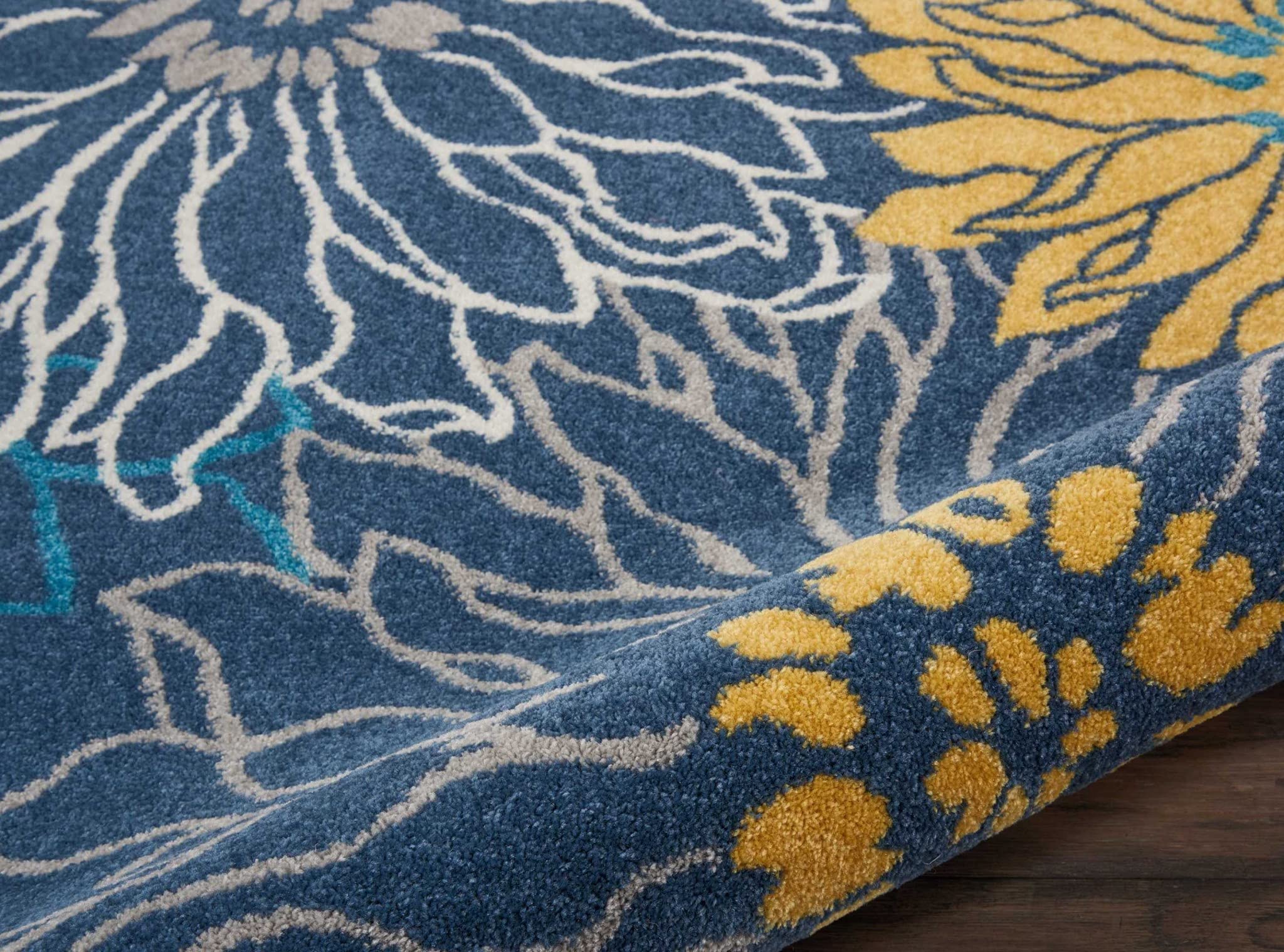 HomeRoots 100% Polypropylene 7’ x 10’ Blue Tropical Flower Area Rug