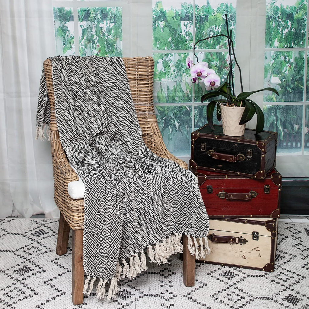 HomeRoots Cotton Boho Black and Beige Woven Diamond Pattern Throw with Tassels