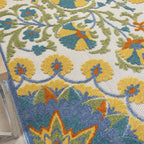HomeRoots 4' Round Ivory and Blue Round Floral Indoor Outdoor Area Rug