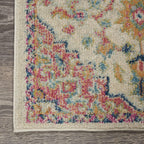 HomeRoots Ivory/Pink 100% Polypropylene 2’ x 8’ Ivory and Pink Medallion Scatter Rug