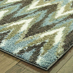 HomeRoots Grey Polyester 4’x6’ Gray and Taupe Ikat Pattern Area Rug