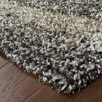 HomeRoots 507868 8 x 11 ft. Charcoal Silver & Gray Abstract Shag Power Loom Stain Resistant Rectangle Area Rug