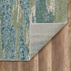 HomeRoots Heat-Set Polypropelene 7’ x 10’ Blue Sage Impressionistic Ocean Area Rug
