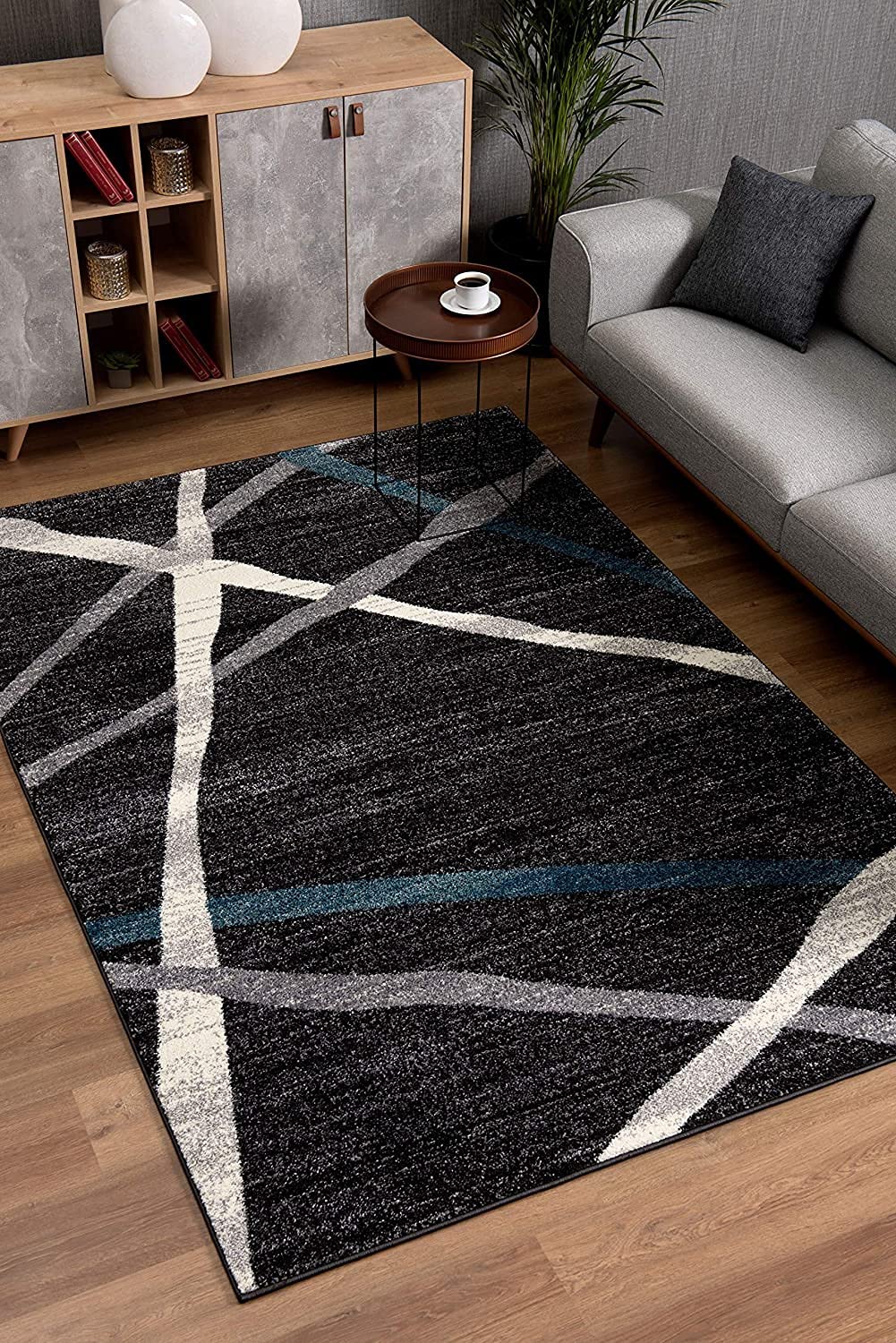 HomeRoots Grey 100% Twisted Polyester 7â€ x 9â€ Distressed Black and Gray Abstract Area Rug