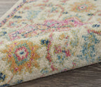 HomeRoots Ivory/Pink 100% Polypropylene 2’ x 8’ Ivory and Pink Medallion Scatter Rug