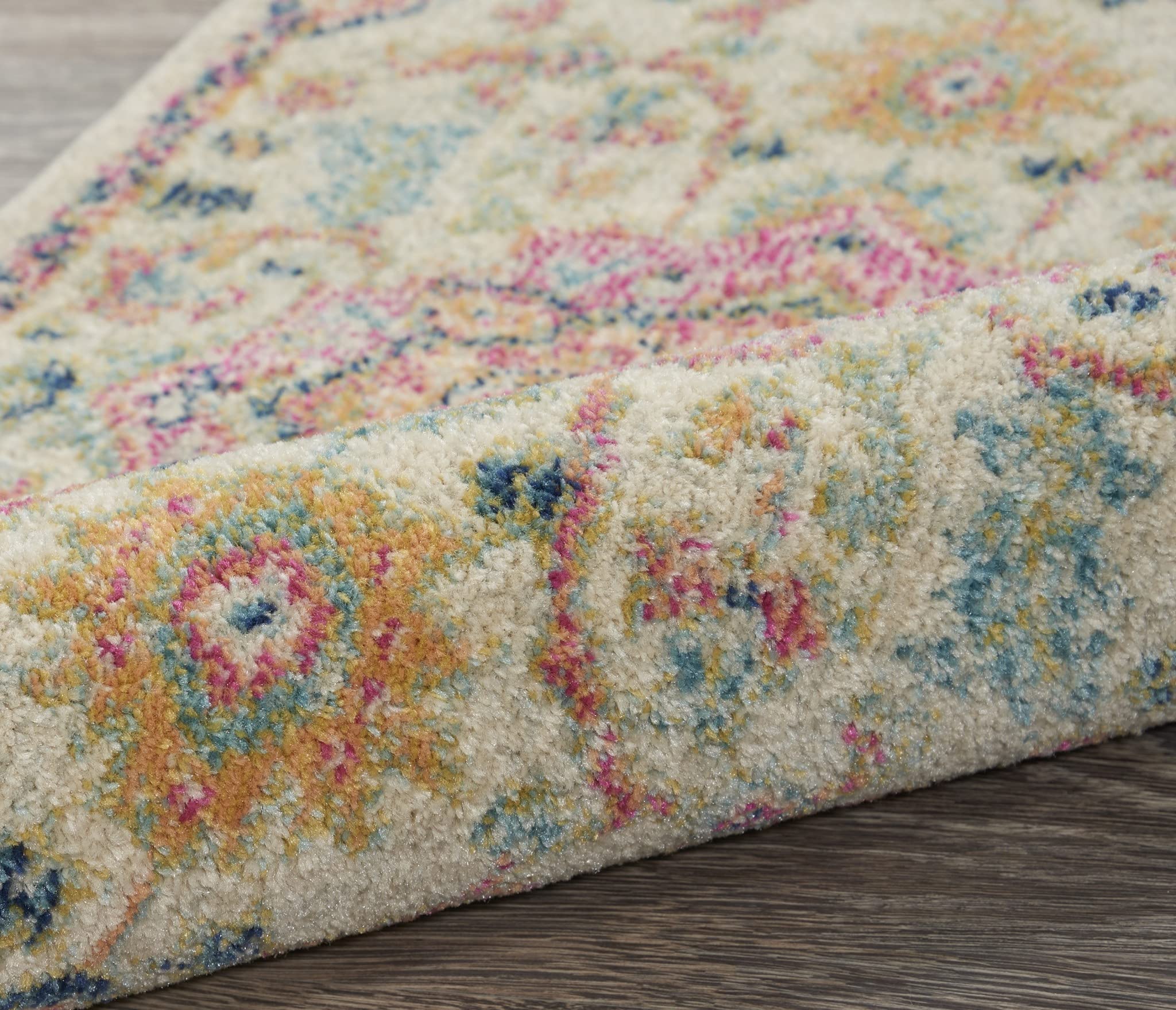 HomeRoots Ivory/Pink 100% Polypropylene 2’ x 8’ Ivory and Pink Medallion Scatter Rug