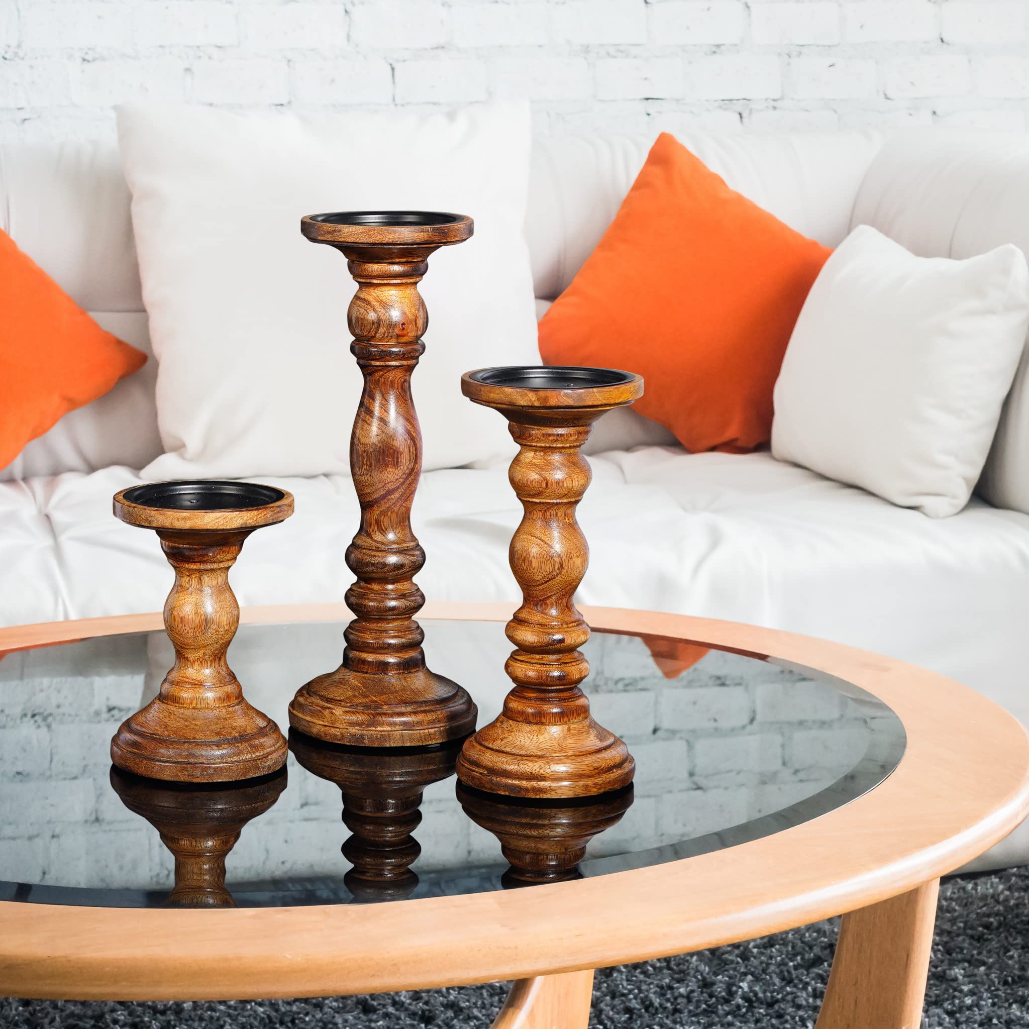 HomeRoots Rustic Wood/Natural Mango Wood Set of Three Warm Brown Genuine Wood Hand Carved Pillar Candle Holders