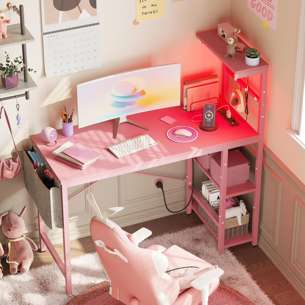 Bestier Gaming Desk 44 Inch with Power Outlets, LED Lights, Reversible Shelves, Headset Hook, Pink 3D Carbon Fiber Engineered Wood