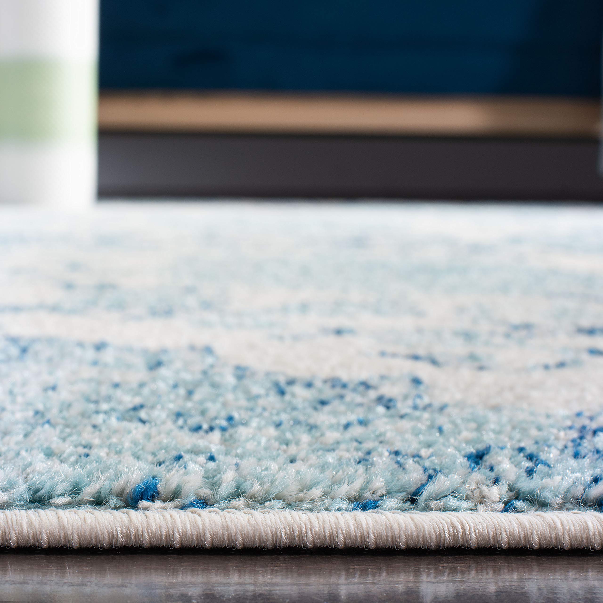 Safavieh Madison Collection Area Rug - 6'7'' X 9'2'', Cream & Turquoise, Boho Chic Glam Paisley Design, Non-Shedding & Easy Care