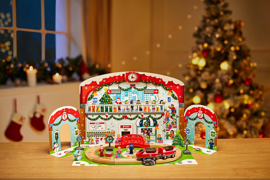 Hape 24 Piece Wooden Christmas Advent Calendar Train Station Set With Decorated Depot Backdrop For Kids, Teens, And Adults, Mult