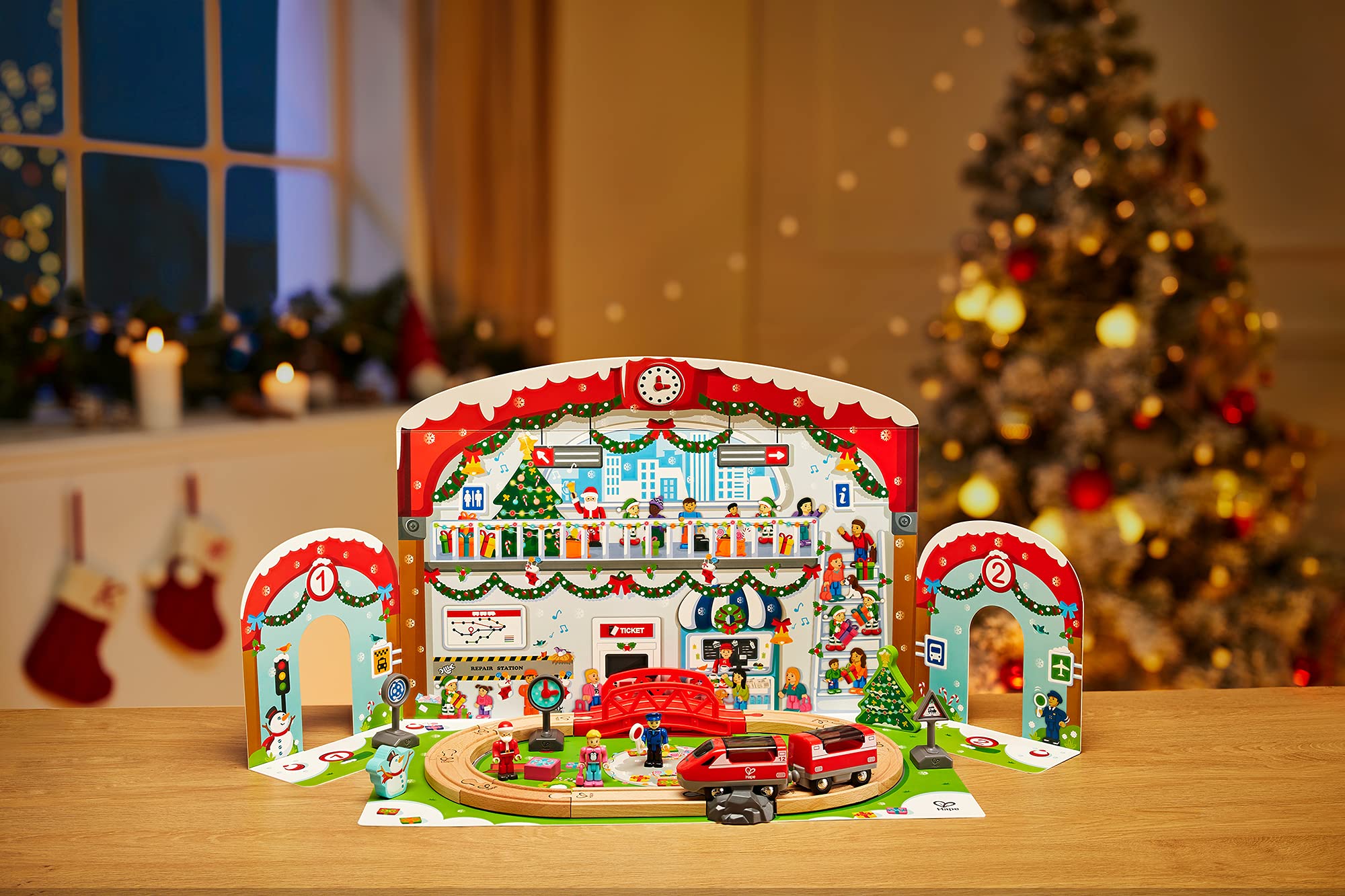 Hape 24 Piece Wooden Christmas Advent Calendar Train Station Set With Decorated Depot Backdrop For Kids, Teens, And Adults, Mult