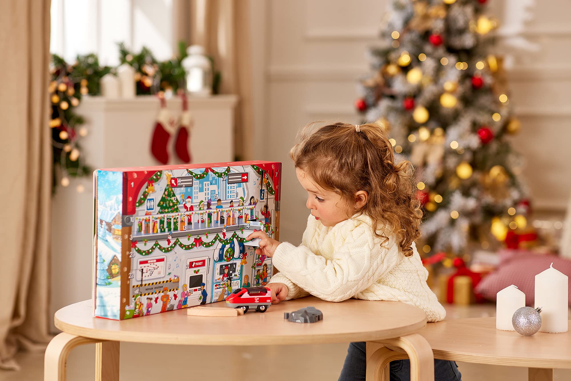 Hape 24 Piece Wooden Christmas Advent Calendar Train Station Set With Decorated Depot Backdrop For Kids, Teens, And Adults, Mult