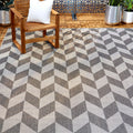 Nicole Miller New York Patio Country Calla Contemporary Herringbone Indoor/Outdoor Area Rug, Black/Grey, 3'11'X5'2'