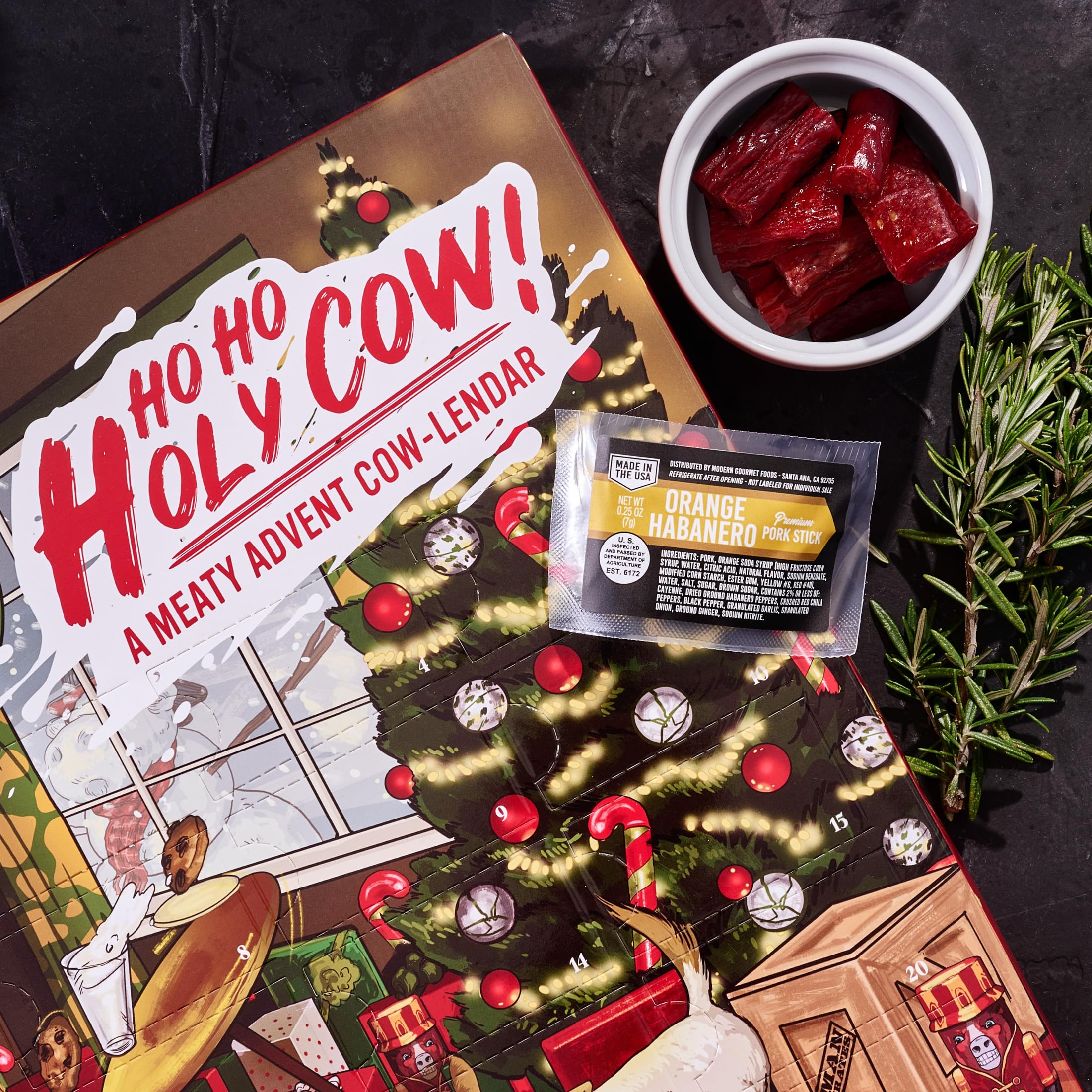 Man Crates Jerky Advent Calendar 2024 - 25 Beef Jerky Bites in Red with Ho-Ho-Holy Cow Artwork - Flavors: Orange Habanero, Rootbeer