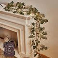 LITBLOOM Lighted Eucalyptus Garland Battery Operated with Timer 6FT 96 LED Artificial Greenery Twig Vine Lights for Room Stairs 