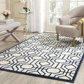 SAFAVIEH Amherst Collection Area Rug - 6 x 9, Ivory & Navy, Geometric Design, Non-Shedding & Easy Care, Ideal for High Traffic