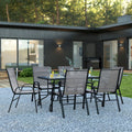 EMMA + OLIVER Seven Piece Indoor/Outdoor Dining Set - Metal Table with Tempered Glass Top - Six Gray Flex Comfort Chairs- Umbrel