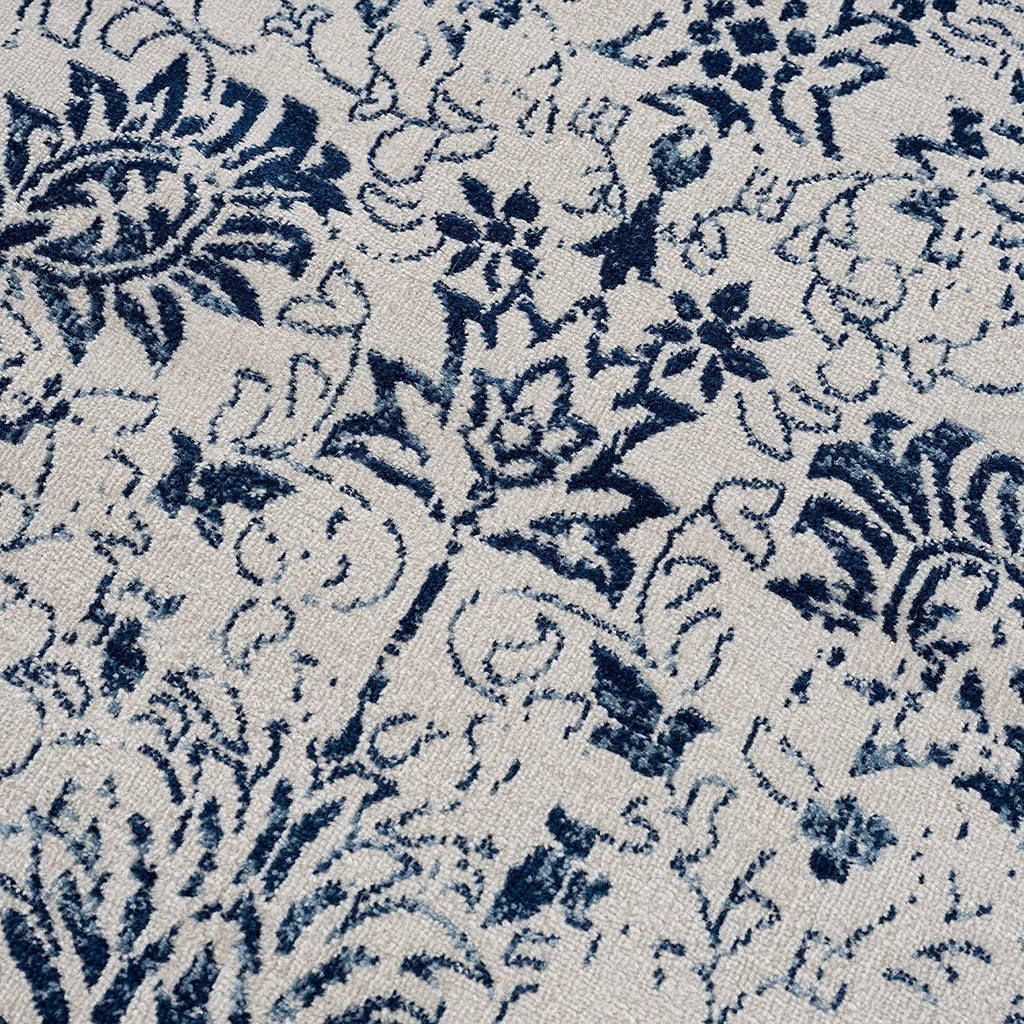HomeRoots 100% Polypropylene 2’ x 3’ Navy Blue Distressed Floral Scatter Rug