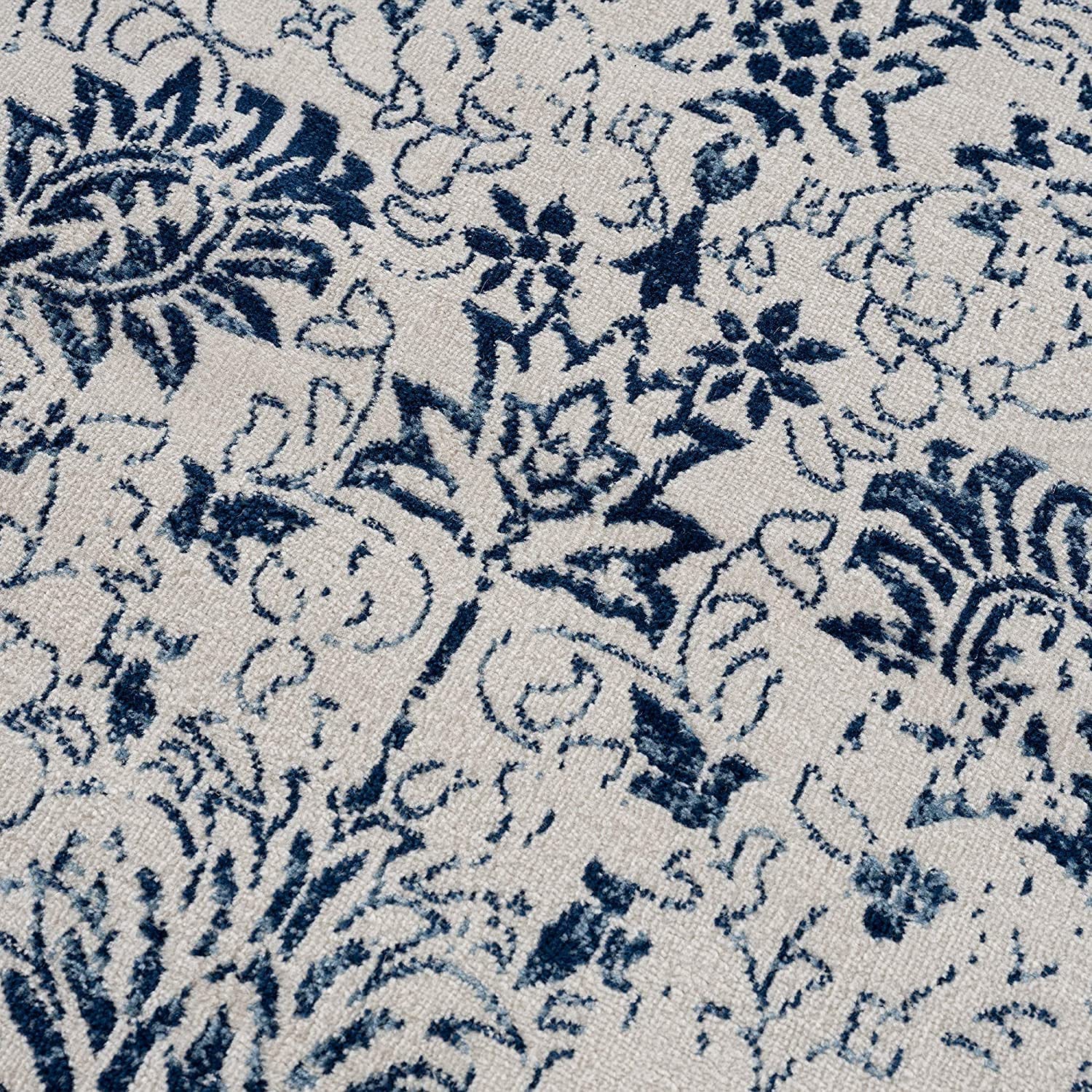 HomeRoots 100% Polypropylene 2’ x 3’ Navy Blue Distressed Floral Scatter Rug