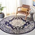 SAFAVIEH Monaco Collection Round Rug - 67 Round, Ivory & Navy, Traditional Design, Slip Resistant & Stain Resistant, Ideal for 