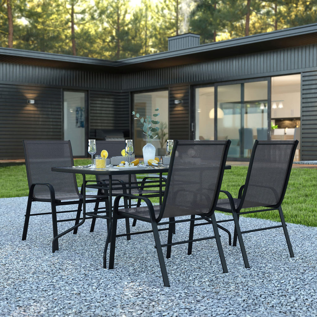 Flash Furniture Brazos 5 Piece Outdoor Patio Dining Set - 4 Black Flex Comfort Stack Chairs - 55&Quot; Tempered Glass Patio Table With Umbrella Hole