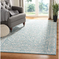 SAFAVIEH Evoke Collection 67 x 9 Ivory / Light Blue EVK242C Non-Shedding Living Room Bedroom Dining Home Office Area Rug