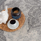 HomeRoots Grey 100% Polypropylene 2’ x 4’ Gray Distressed Medallion Area Rug