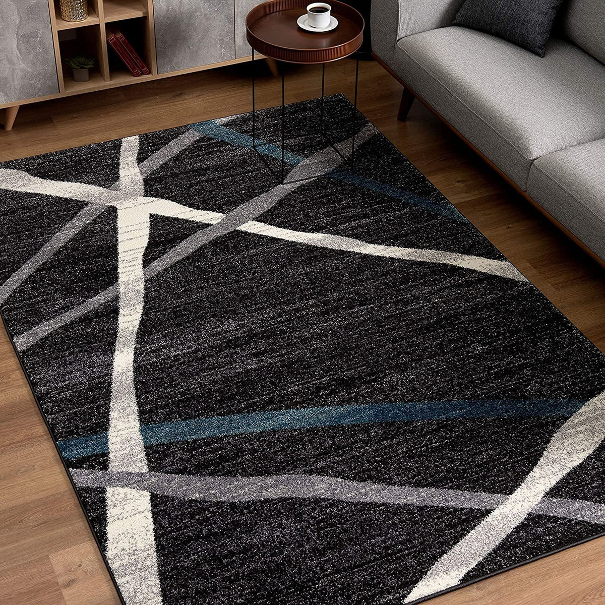 HomeRoots Grey 100% Twisted Polyester 7â€ x 9â€ Distressed Black and Gray Abstract Area Rug