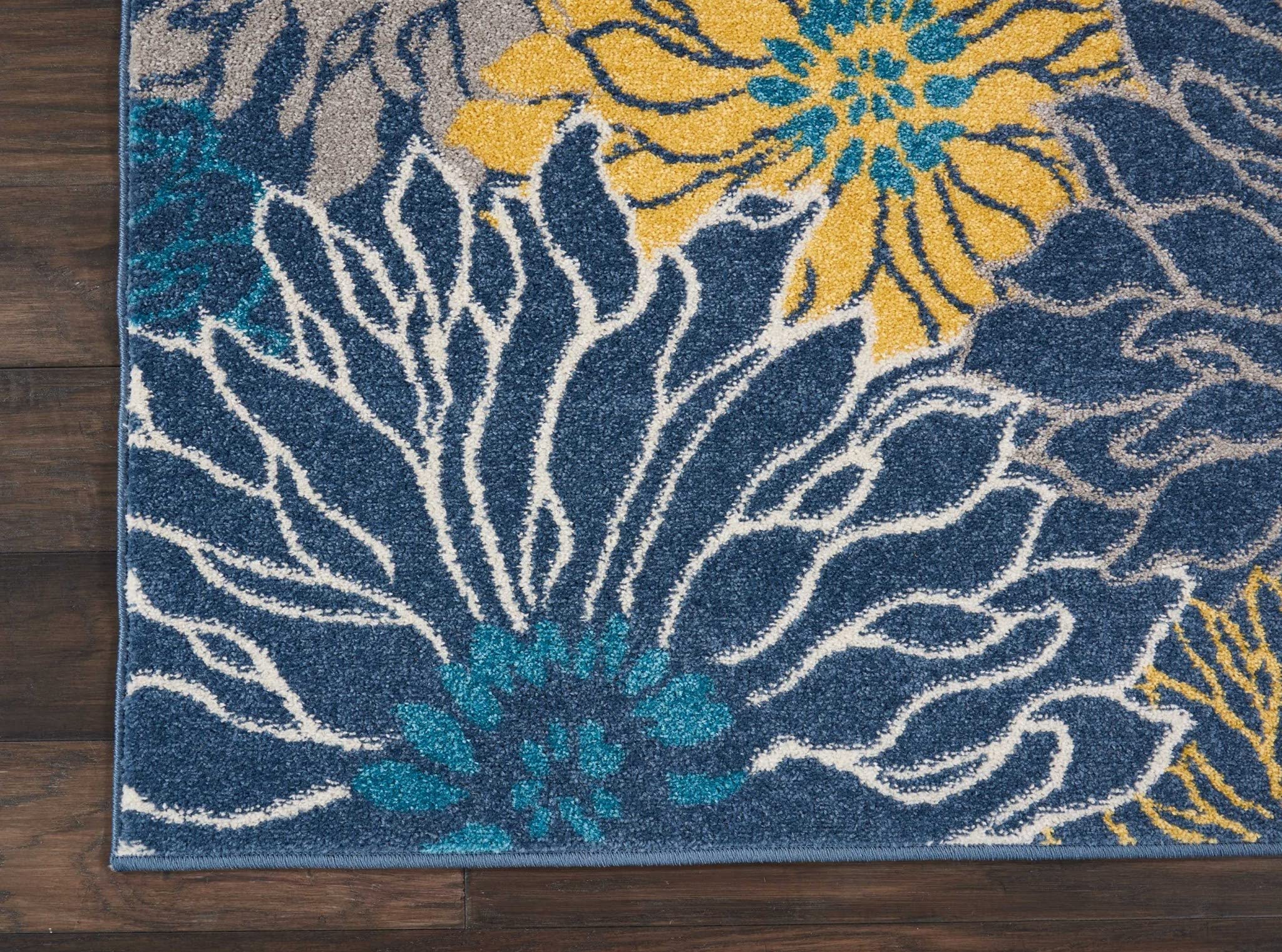 HomeRoots 100% Polypropylene 4’ x 6’ Blue Tropical Flower Area Rug