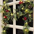 MINDELF 6 FT Artificial Christmas Garland, Faux Cypress Leaf Evergreen Garland with 20 LED Lights, Red Berries and Pinecones, Gr