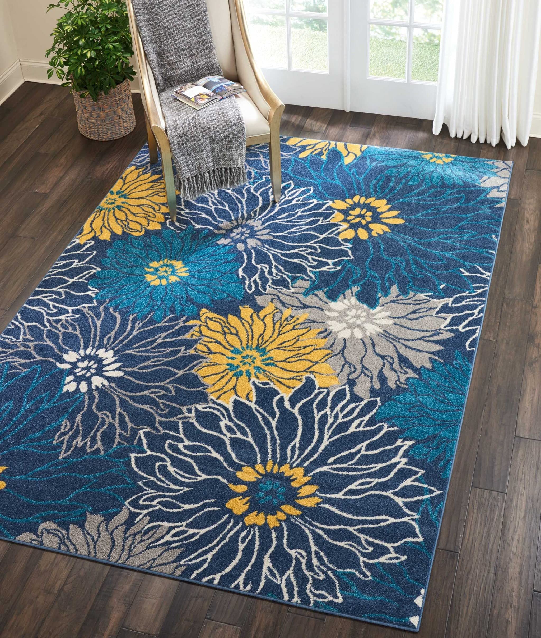 HomeRoots 100% Polypropylene 7’ x 10’ Blue Tropical Flower Area Rug