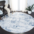SAFAVIEH Amelia Collection Area Rug - 9' Round, Ivory & Navy, Modern Abstract Design, Non-Shedding & Easy Care, Ideal for High T