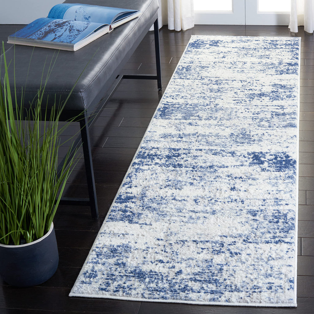 SAFAVIEH Amelia Collection Runner Rug - 2'2'' x 8', Ivory & Navy, Modern Abstract Design, Non-Shedding & Easy Care, Ideal for Hi